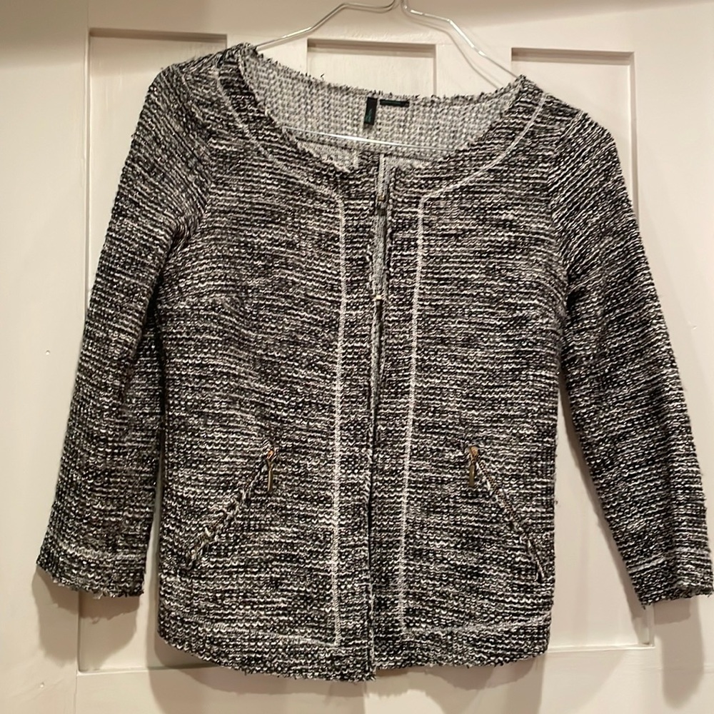 Thin 3/4 length blazer.  Perfect to eat over a dress.